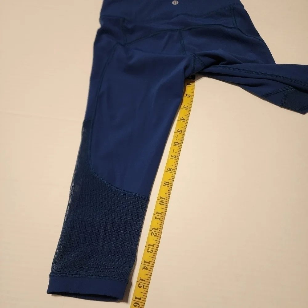 Lululemon size 2 Gear up blue Poseidon cropped leggings with sheer accents